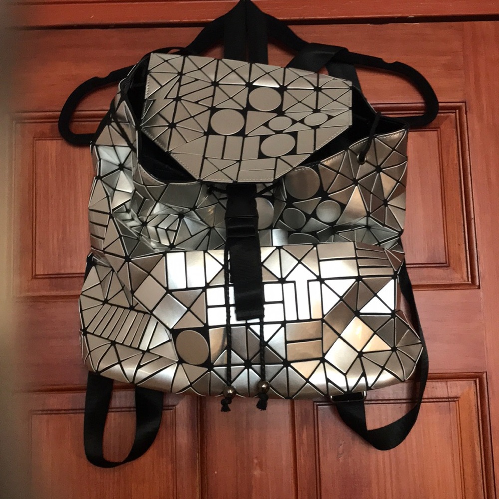 Worn once trendy backpack! Show stopper!